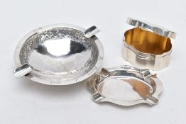 A SILVER TRINKET AND ASHTRAY WITH ANOTHER WHITE METAL ASHTRAY, to include a wavy edge plain polished