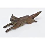 A COLD PAINTED BRONZE FOX, in a running position holding something in its mouth, approximate