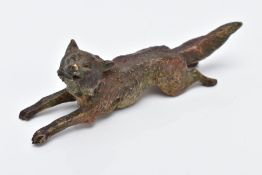 A COLD PAINTED BRONZE FOX, in a running position holding something in its mouth, approximate