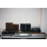 A SELECTION OF VINTAGE HI FI EQUIPMENT including a Bush Arena Hi Fi, a Minerva RST 400 Music Centre,