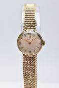 A LADIES MID TO LATE 20TH CENTURY 9CT GOLD OMEGA WRISTWATCH, round silver dial signed 'Omega',