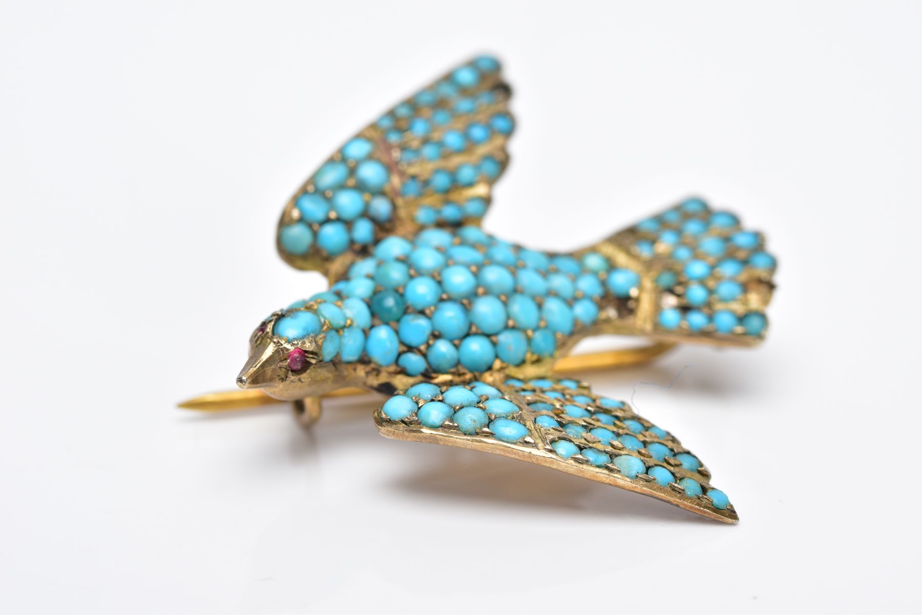 A VICTORIAN SILVER GILT TURQUOISE SET BROOCH, in the form of a bird set with red paste eyes and an - Image 2 of 4