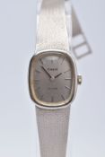 A LADIES 14CT WHITE GOLD TISSOT WRISTWATCH, rounded square silver dial signed 'Tissot Stylist',