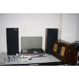A FERGUSON STUDIO 20D MUSIC CENTRE with two speakers (PAT fail but working, turntable slow to start,