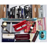 A BOX CONTAINING A VARIETY OF PENS, WRISTWATCHES AND TWO JEWELLERY BOXES, to include a variety of