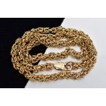 A YELLOW METAL HEAVY CHAIN, byzantine chain designed with plain and textured multi joined circular