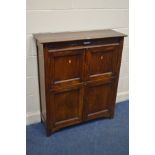 AN EARLY TO MID 20TH CENTURY OAK PANELLED FOUR DOOR CUPBOARD, width 92cm x 33cm x height 107cm