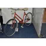 A VINTAGE LADIES BICYCLE with a Brooks saddle