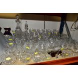 A QUANTITY OF CUT GLASSWARES, ETC, to include two decanters, various glasses (wines, tumblers,