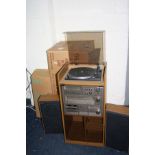 A BOXED VINTAGE AMSTRAD TS-80 TOWER HI FI, in its original hifi cabinet and matching speakers (