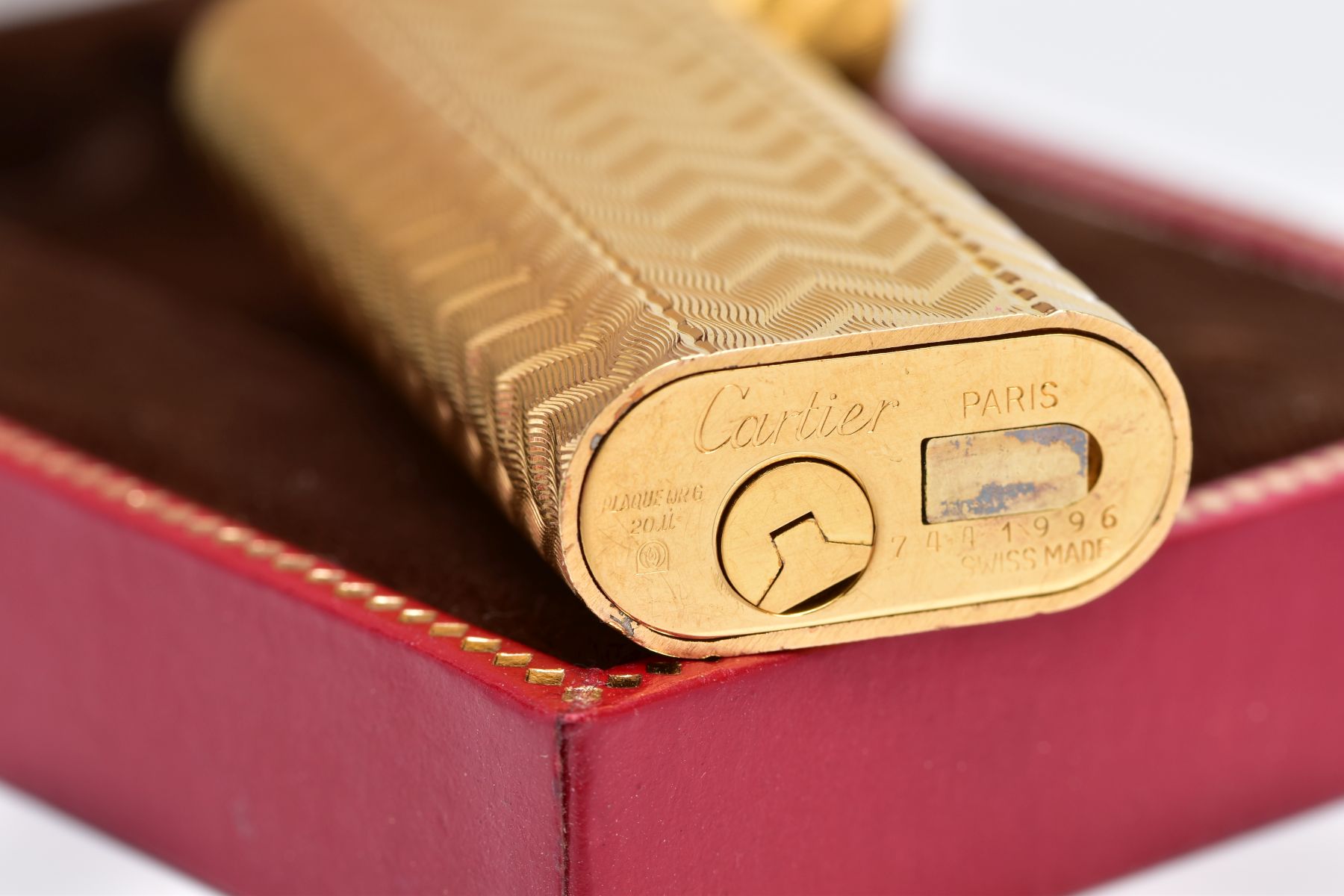 A CARTIER GOLD PLATED LIGHTER, oval rectangular form with engine turned engraving decoration, signed - Image 3 of 4