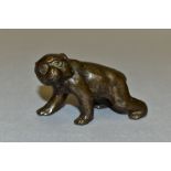 A JAPANESE BRONZE OF A MACAQUE ON ALL FOURS, indistinct character marks to the belly, 112.6 grams,