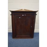 A 19TH CENTURY SCUMBLED PINE HANGING SINGLE DOOR CORNER CUPBOARD, width 94cm x depth 53cm x height