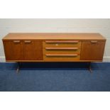 AN EARLY TO MID 20TH CENTURY TEAK SIDEBOARD, with double cupboard doors, a fall front door, both