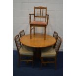 A SET OF FOUR 1970'S TEAK SPINDLE BACK CHAIRS, possibly Afred cox, together with a modern beech