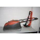 A FLYMO VISION COMPACT 330 ELECTRIC LAWN MOWER (PAT fail due to taped cable) , a Flymo Strimmer