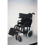 AN AFORDABLE CARE COMPANY FOLDING WHEELCHAIR with footrests