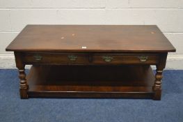 A REPRODUCTION OAK COFFEE TABLE, with two drawers and undershelf, width 122cm x 61cm x height 47cm