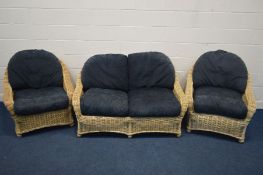 A WICKER THREE PIECE CONSERVATORY SUITE, comprising a two seater settee, width 145cm, and a pair