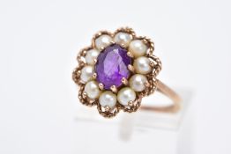 A 9CT GOLD AMETHYST AND SPLIT PEARL CLUSTER RING, the raised cluster designed with a central oval