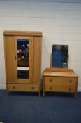 AN EARLY TO MID 20TH CENTURY GOLDEN OAK TWO PIECE BEDROOM SUITE, comprising a single mirror door