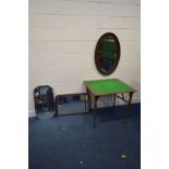 A 1940'S OAK FRAMED BEVELLED EDGE OVAL WALL MIRROR, along with two other wall mirrors, and a folding