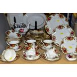 A ROYAL ALBERT OLD COUNTRY ROSES PART DINNER SERVICE AND A ROYAL ALBERT 'SENORITA' PATTERN TEAPOT,