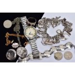 A SILVER JEWELLERY COLLECTION, to include a silver charm bracelet, three pence coin bracelet, a