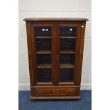 A REPRODUCTION EDWARDIAN STYLE MAHOGANY AND BOX STRUNG TWO DOOR BOOKCASE, with bevelled glass