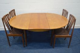 AN EARLY TO MID 20TH CENTURY TEAK CIRCULAR EXTENDING DINING TABLE, with one additional fold out