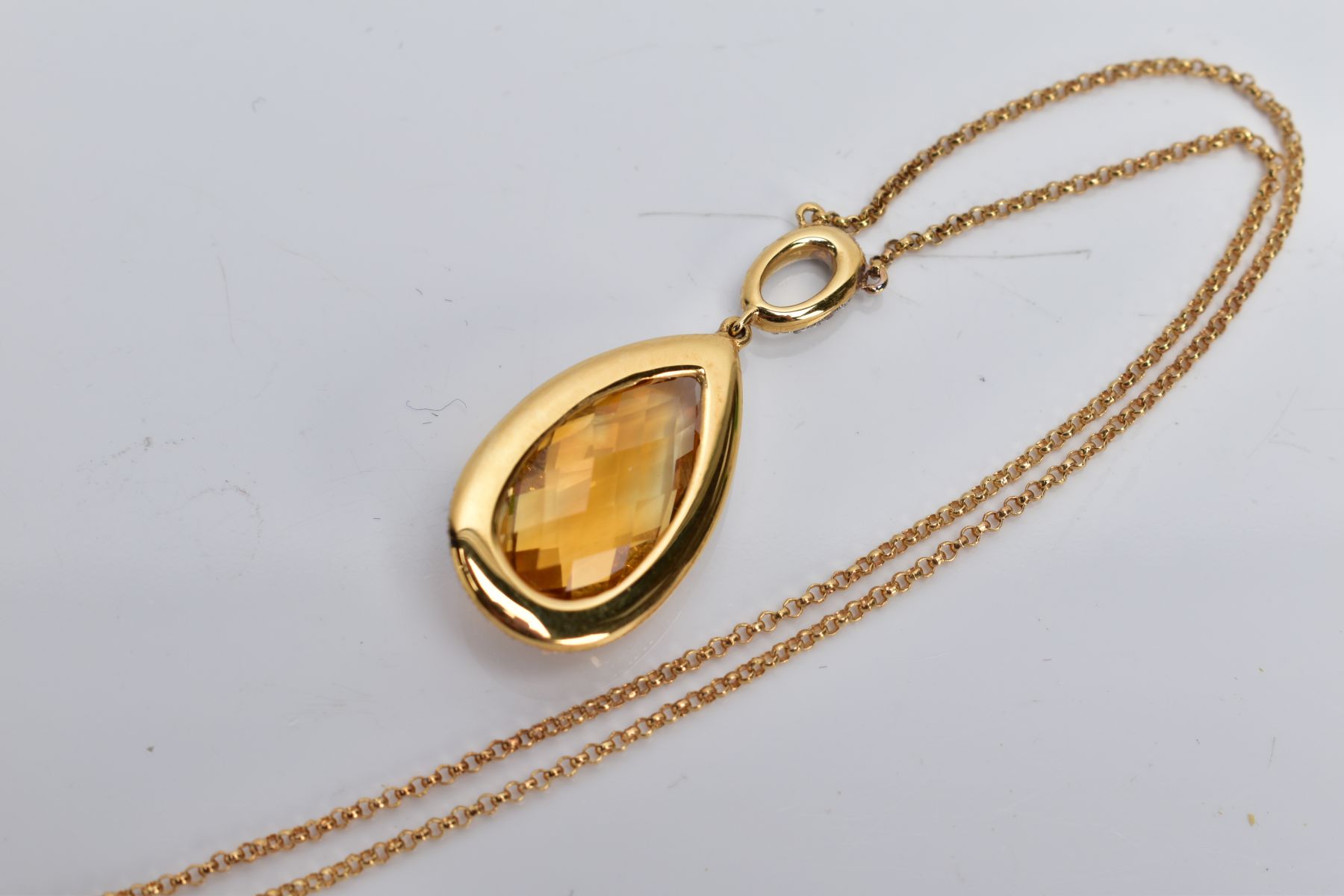 AN 18CT GOLD CITRINE AND DIAMOND PENDANT NECKLET, designed with a claw set pear cut citrine, - Image 4 of 5