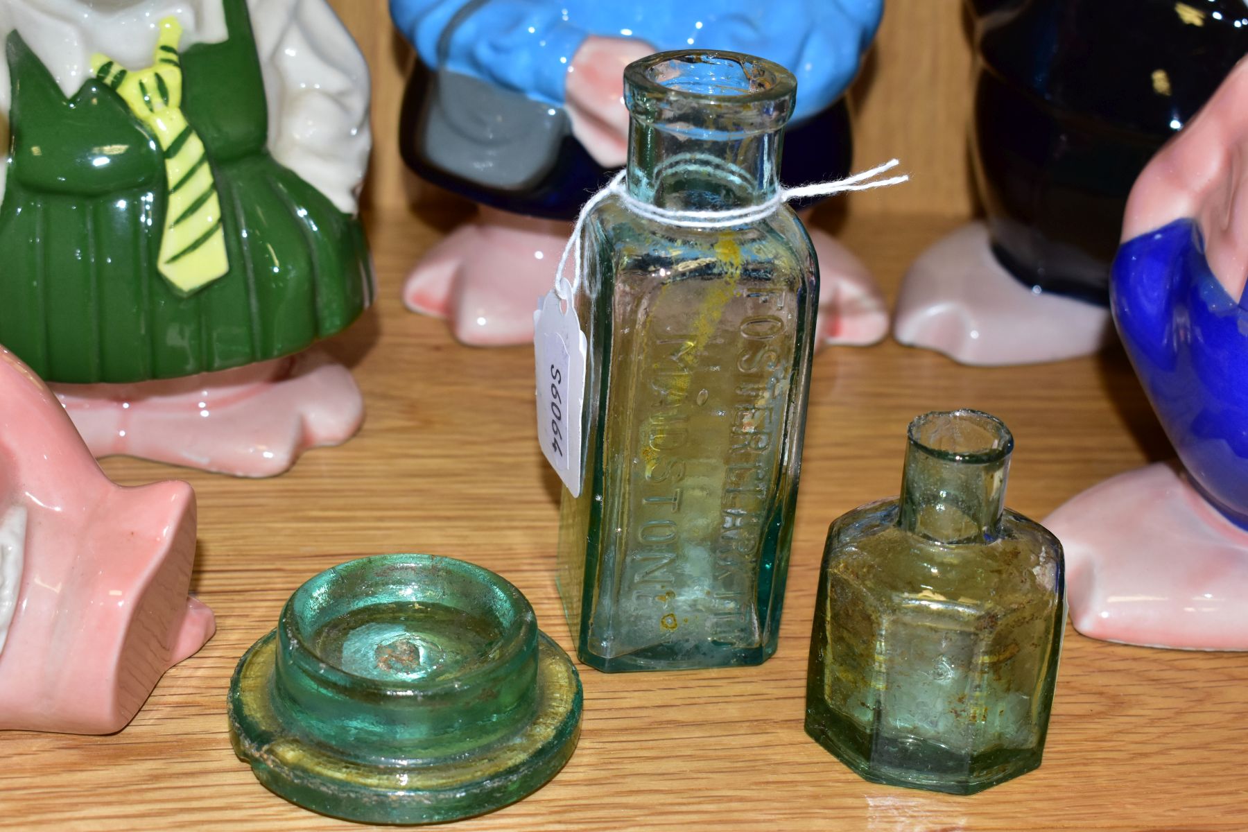 A SET OF FIVE WADE NATWEST PIGGY BANKS, all with Natwest black plastic stoppers, a clear glass - Image 3 of 7