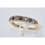 A 9CT GOLD SAPPHIRE AND CUBIC ZIRCONIA HALF HOOP RING, designed with a row of three circular cut