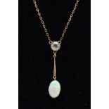 AN EARLY 20TH CENTURY OPAL AND AQUAMARINE TWO STONE PENDANT, an oval opal measuring approximately