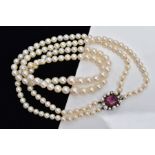 A CULTURED PEARL NECKLACE, designed with two strands of graduated cultured pearls, measuring