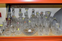 A QUANTITY OF CUT AND MOULDED GLASSWARE, including eight decanters, one with glue collar, assorted