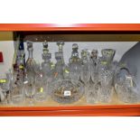 A QUANTITY OF CUT AND MOULDED GLASSWARE, including eight decanters, one with glue collar, assorted