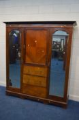 AN EDWARDIAN MAHOGANY COMPACTUM WARDROBE, with double mirrored doors, width 190cm x depth 60cm x