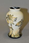 A SMALL MOORCROFT POTTERY VASE, 'Cornflower' pattern dated 2001, impressed backstamp and paw print