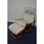 A CREAM LEATHER STRESSLESS RECLINING SWIVEL CHAIR, and matching footstool (worn leather, missing