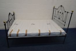 SEVENTH HEAVEN, A MID VICTORIAN CAST IRON AND BRASS 4FT6 BEDSTEAD