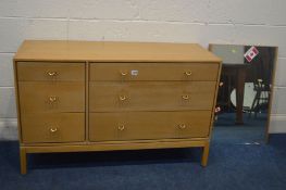 JOHN AND SYLVIA REID FOR STAG, a low oak chest of six drawers, with rounded brass handles, width