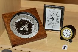 A SMALL EBONY CIRCULAR DESK CLOCK, enamel dial with Roman numerals and inscribed 'Bagshaw Liverpool'