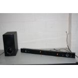 A LG 300W BLUETOOTH SOUND BAR and wireless active subwoofer (both PAT pass and working)
