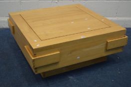 A SQUARE 1970'S BLONDE ELM COFFEE TABLE, each corner with drawers, 94cm squared x height 38cm
