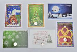 A GROUP OF ISLE OF MAN CHRISTMAS FIFTY PENCE COINS, all diamond finished on greeting cards with C.