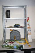 A GALVANISED GARAGE SHELVING UNIT, a hose reel, three locks, a tool caddy, a hose reel cart, and