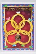 A COLOURED ISLE OF MAN CHRISTMAS FIFTY PENCE Pobjoy diamond finish on card, a few coins have been