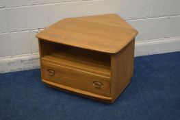 AN ERCOL BLONDE ELM TV STAND, with a triangular drop down back, above a single drawer, width 73cm