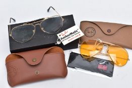 TWO PAIRS OF RAY-BAN OUTDOORSMAN GLASSES, the first pair with yellow tinted sunglasses signed 'Ray-